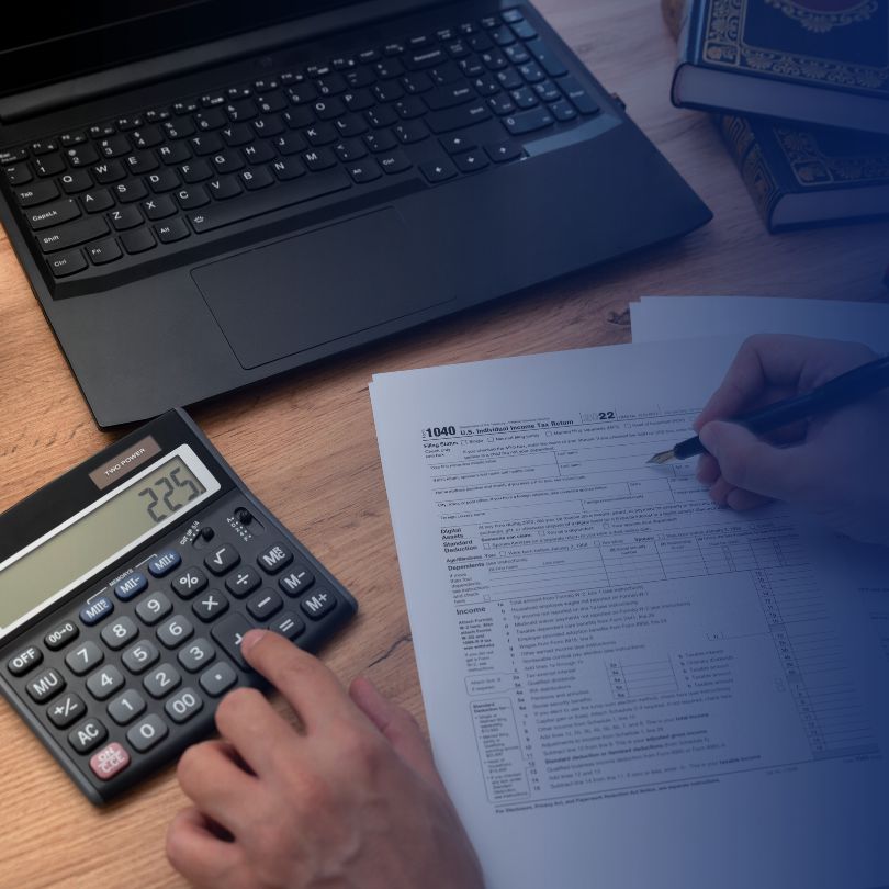 Documentos e computador para declaração do Imposto de Renda 2026.